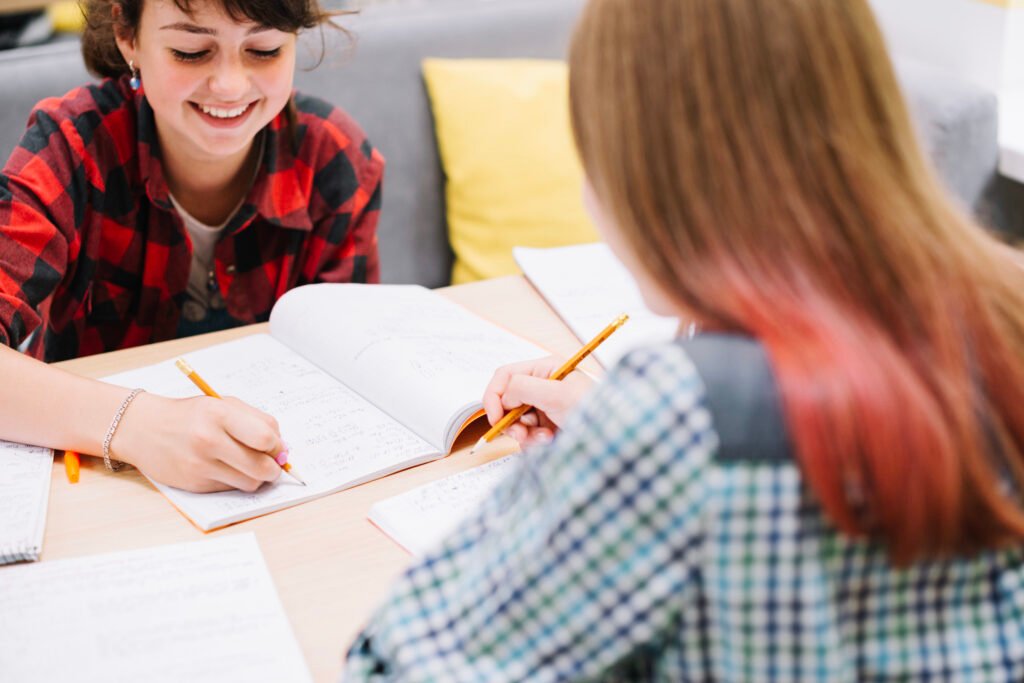 cheerful girls learning together scaled