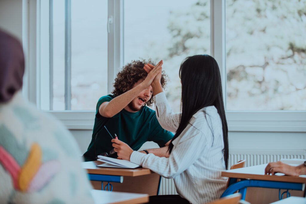 heartwarming scene diverse group students enthusiastically highfive each other celebrating scaled